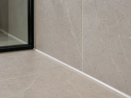 Close-up of a floor tile edge and transition