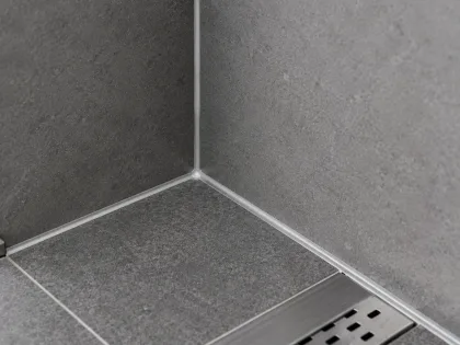 Close-up of a resealed shower joint